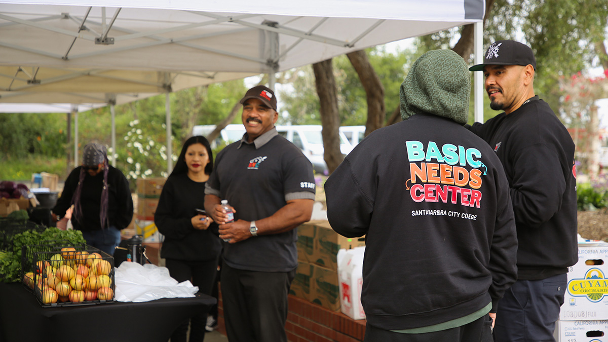 Attendees browsing produce at a food distribution